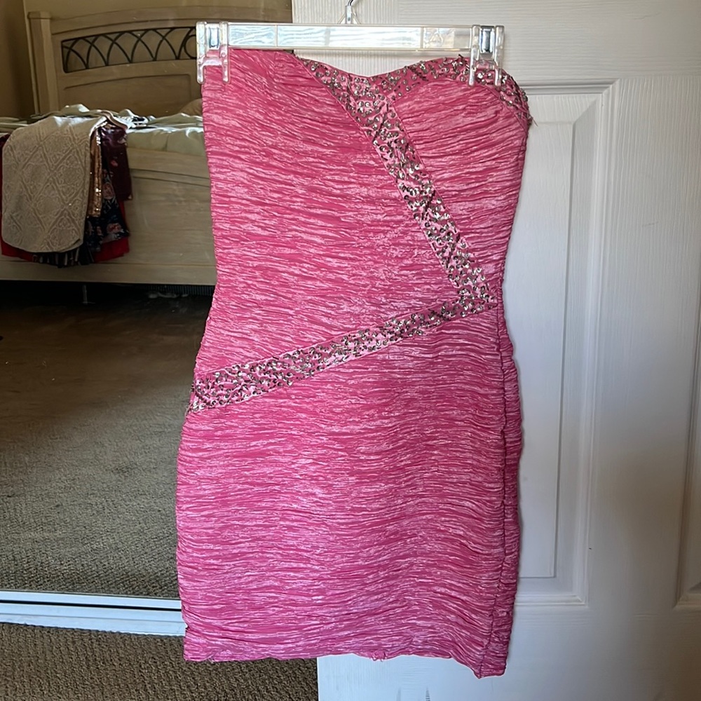 Size Medium pink beaded dress. Only worn a few times.